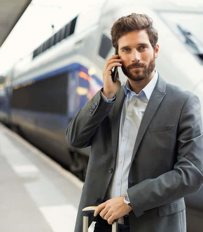 Man on train station platform