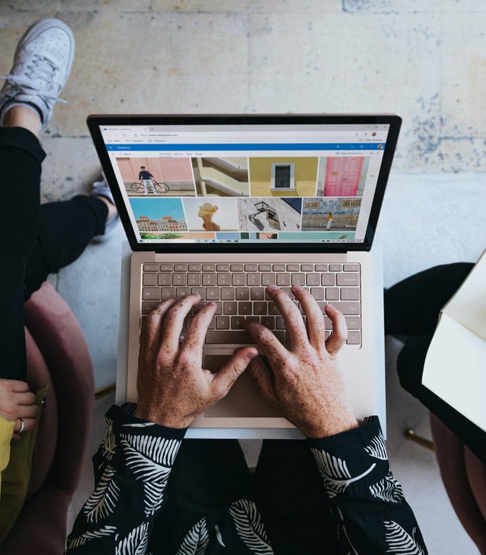 Marketing worker using laptop