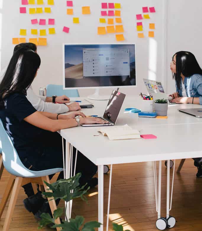 Online meeting with whiteboard in the background