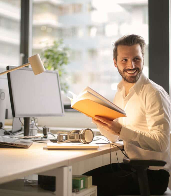 Happy man in the workplace