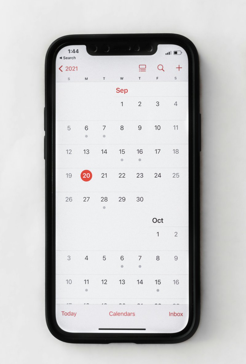 a phone with a calendar on the screen